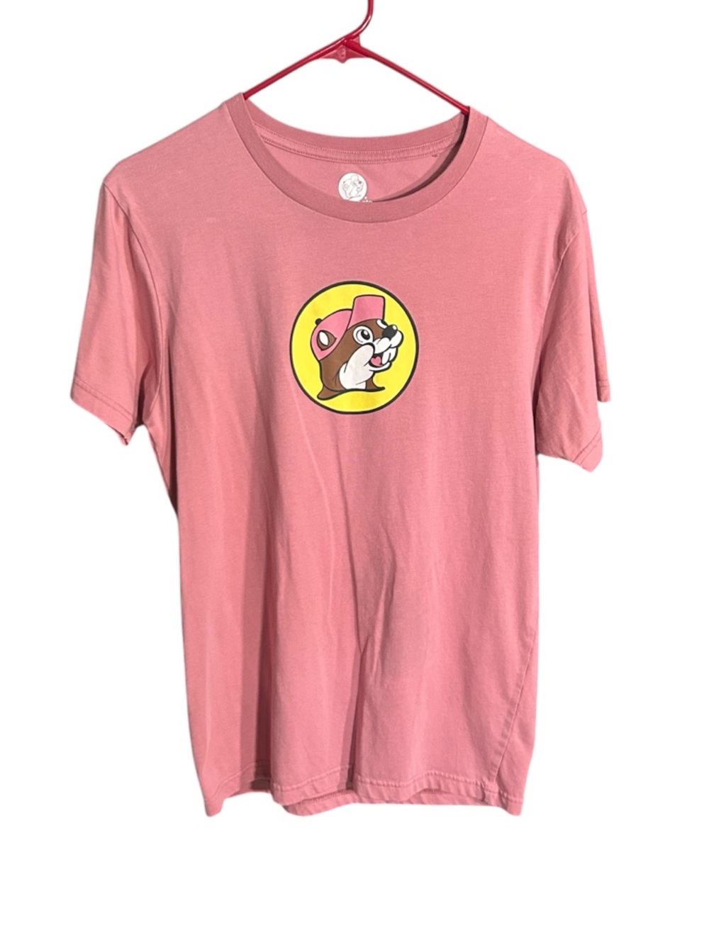 Pink Buc-ee’s Graphic Tee with Buc-ee's Logo and “Keep on Smiling” on back